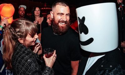 Taylor Swift and Travis Kelce talking with Marshmello at the Chiefs after party