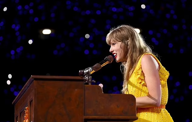 Taylor Swift at Tour playing piano