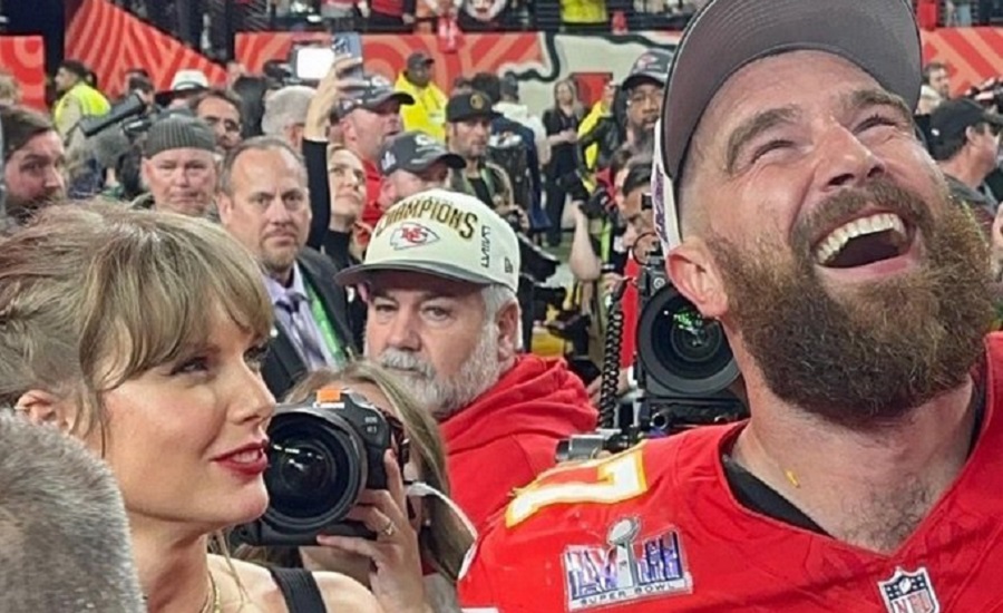 Travis Kelce laughs with Taylor Swift after winning the Super Bowl