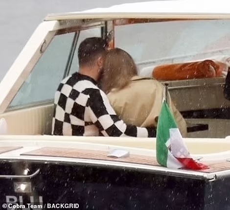 Taylor Swift and Travis Kelce Share a Kiss on Romantic Boat Ride in Lake Como During Eras Tour Break — See Photos!