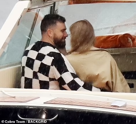 Taylor Swift and Travis Kelce Share a Kiss on Romantic Boat Ride in Lake Como During Eras Tour Break — See Photos!