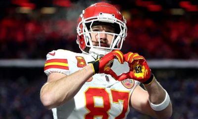 Travis Kelce heart sign